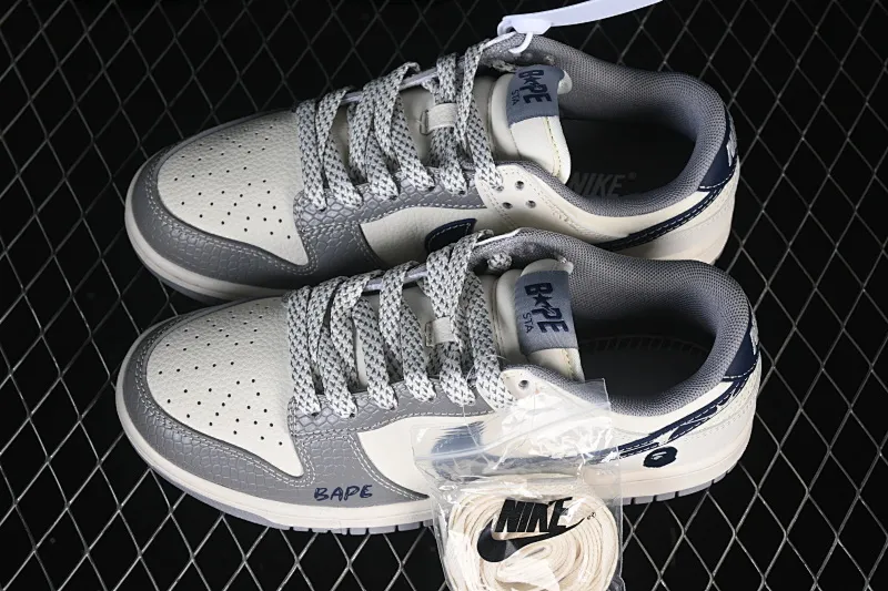 All Categories Nk SB Dunk Series Nk SB Dunk Low High-end Customized Low-top Shoes Nike SB Dunk Low Ape Man Head Joint Beige Gray Black Anniversary High-end Customized Low-top Casual Shoes JP1628-036